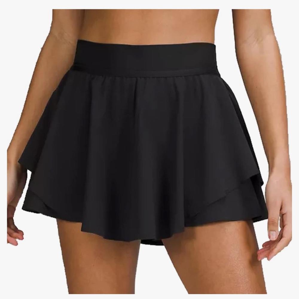 Husnainna Ladies size 10 tennis skirt with pockets.